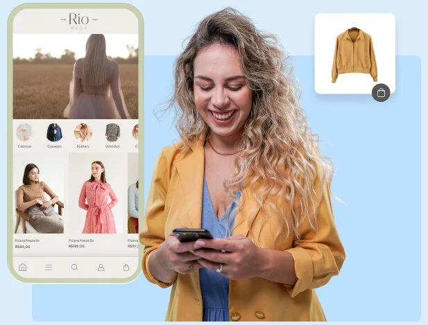 Empreendedora usando blazer amarelo, segurando celular e ao lado, exemplo do layout de sua loja online