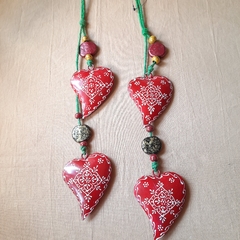 Corazones dobles colgantes en internet