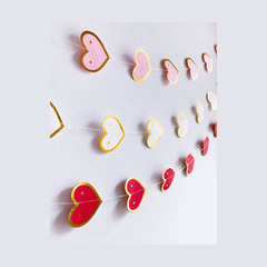 GUIRNALDA CORAZONES ROSA CON BORDES DORADO