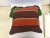 Cojín decorativo tejido colores tierra - tienda online