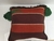 Cojín decorativo tejido colores tierra