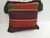 Imagen de Cojín decorativo tejido colores tierra