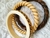 Pulsera tachas beige