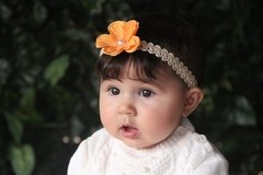 Tiara de Bebê Flor Laranja na internet
