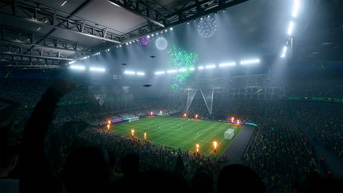 Versión en el juego de un estadio de fútbol iluminado y abarrotado.