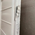 Porton de chapa FORTUNA ECO 11401 2.40x2.05m con ventana-postigo 1/4 superior - Fortunas Aberturas