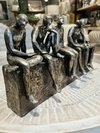 Escultura Descanso sentados