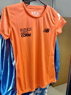 Remera New Balance Naranja Buenos Aires Corre hombre o mujer - comprar online