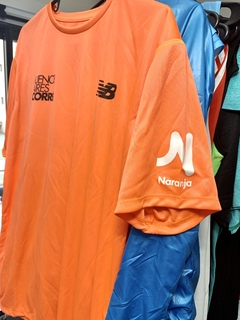 Remera New Balance Naranja Buenos Aires Corre hombre o mujer - tienda online