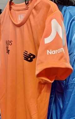 Remera New Balance Naranja Buenos Aires Corre hombre o mujer - FotoRun Shop