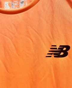 Remera New Balance Naranja Buenos Aires Corre hombre o mujer