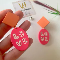 Aros colgantes “love” en internet