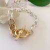 Pulsera hipoalergénica plateado mate con dorado