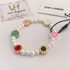Pulsera perlas con logo