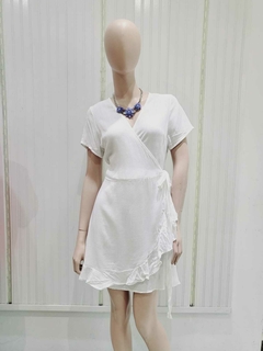 VESTIDO CRUZADO DE LINO. en internet