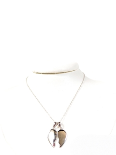 Collar de plata 925 con dije de corazón partido