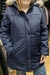 Campera de mujer larga con capucha desmontable.