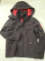 Campera de nene con tela impermeable y capucha desmontable con cierre. SOLO TALLE 6 Y 8.