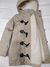 Campera de nena larga tipo montgomery con capucha fija. en internet