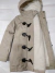 Campera de nena larga tipo montgomery con capucha fija. en internet