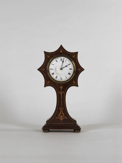 Reloj de madera con marqueterie