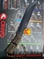 Machete Explorer de acero plegado color negro con hoja enteriza, mango táctico, y además incluye funda de cordura.