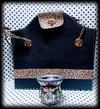 Cartera Matera Negra y Animal Print