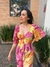 Vestido midi estampado com lastex babado e mangas flare.