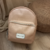 Mochila Camille Charol Nude