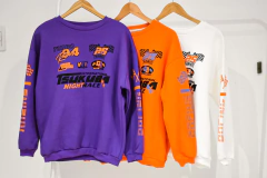 BUZO OVERSIZE RACE NARANJA en internet