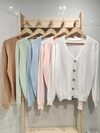 SNS22 CARDIGAN CON BOTON DE COCO