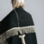 Poncho negro y blanco