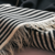 Poncho negro y blanco - comprar online