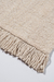 Pié de cama de lana natural con flecos - comprar online