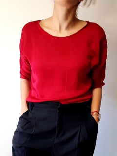 Blusa roja con moño