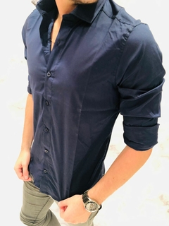 Camisa lisa cuello Común