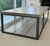 (JB) Mesa baja estructura hierro, tapa cemento, de La Compañía / 140 × 70 × 40