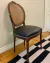 (LP) 6 sillas y 2 cabeceras de esterilla, tapizadas en ecocuero negro / 50 x 49 x 45/98 sillas. 56x 56 x 47/1,02 cabeceras.