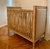 (LP) 2 cunas de madera tapizados en lino beige, con colchones. / 1,30 x 74 x 1,10