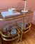 (SF) Mueble bar dorado y estantes de vidrio esfumado con ruedas / 90x47x79 - comprar online