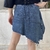 Mini saia jeans desconstruída - teres