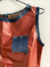 Regata cropped com bolsinho jeans na internet