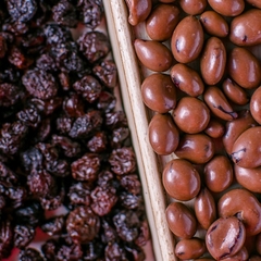 Pasas de uva bañadas con chocolate leche x100gr
