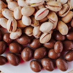 Pistacho bañados con chocolate leche x100gr