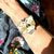 Pulseira Borboleta branca no braço