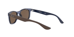 Rayban 0RJ9052S 706873 JUNIOR NEW WAYFARER TRANSPARENT BLUE - tienda online
