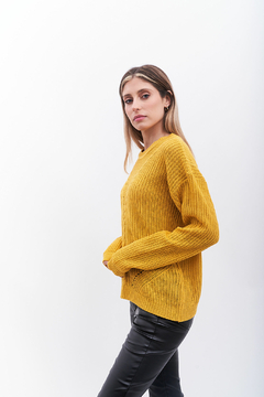 Sweater tejido , tramado y calado en V . en internet