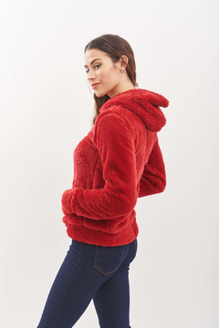 Campera de corderito bifaz. Con capucha y bolsillos. en internet