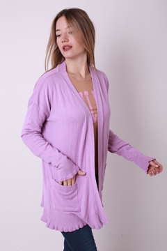Saco de angora, con bolsillos y terminación en volado en internet