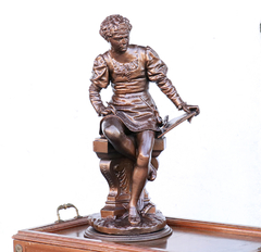 figura dorada poeta adorno